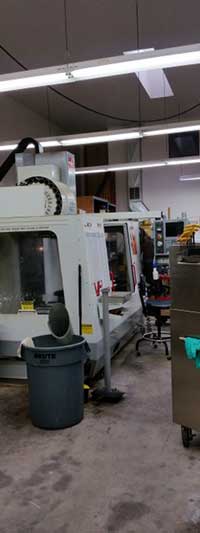 CNC Mills used to grind the surface of industrial machine parts and tools