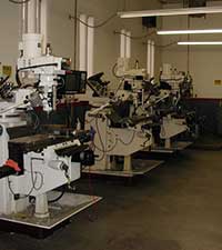 CNC Mills used to grind the surface of industrial machine parts and tools