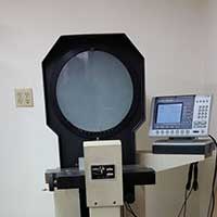 An optical comparator used to inspect custom parts